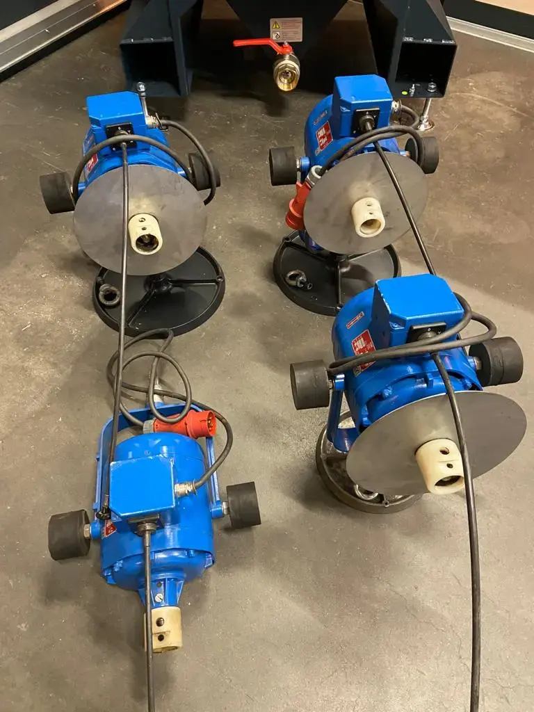 Multiple Suhner and Pferd Hanging motors, flexible shaft machines
